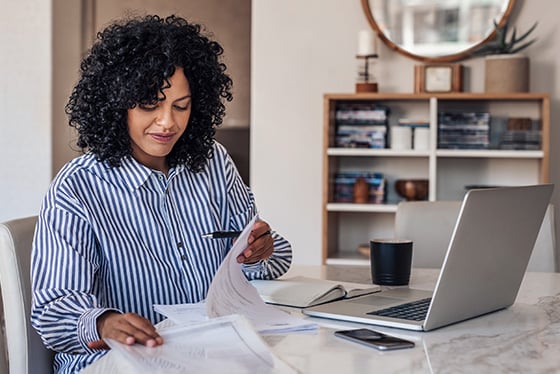 professional working from home on laptop