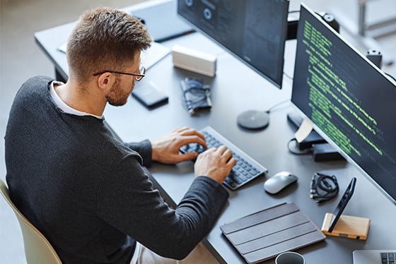 programmer working on computer