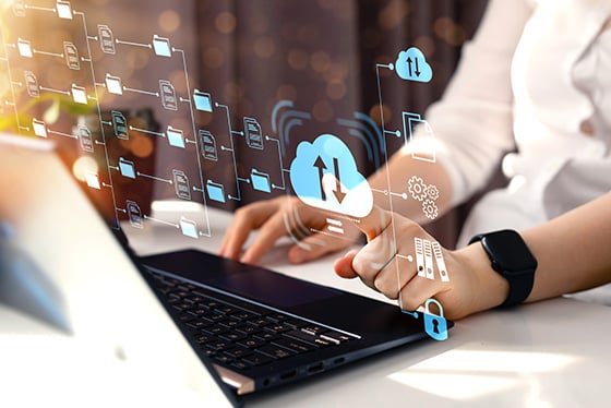 professional working on computer with cloud capabilities