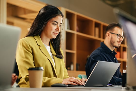 professional working on laptop
