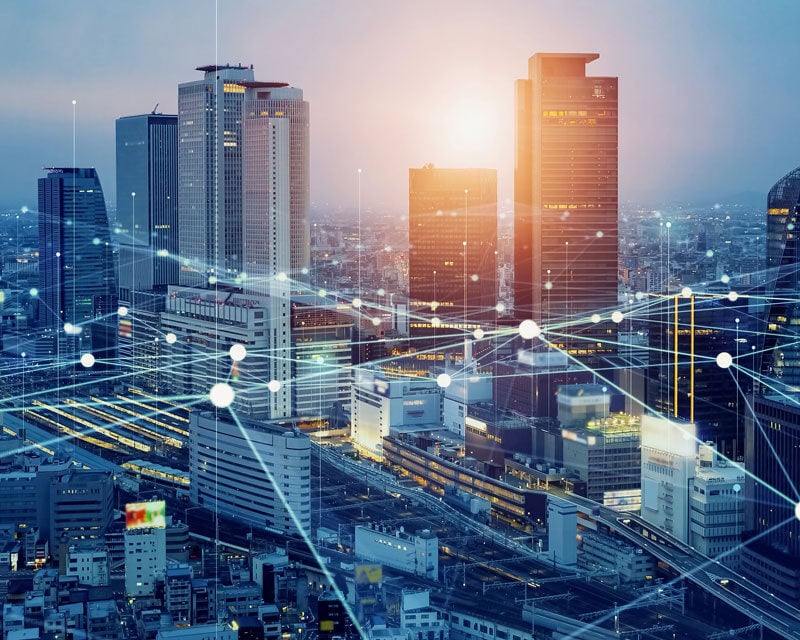 Abstract technology points within a cityscape.