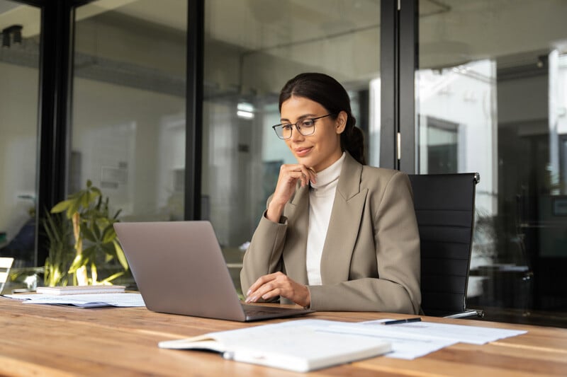 financial professional working on computer