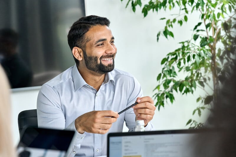 male in a meeting